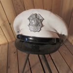 Iowa security service peaked cap and badge (1970s) 1