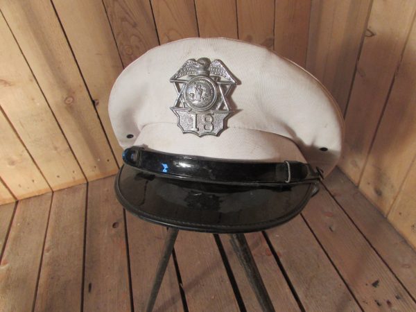 Iowa security service peaked cap and badge (1970s)